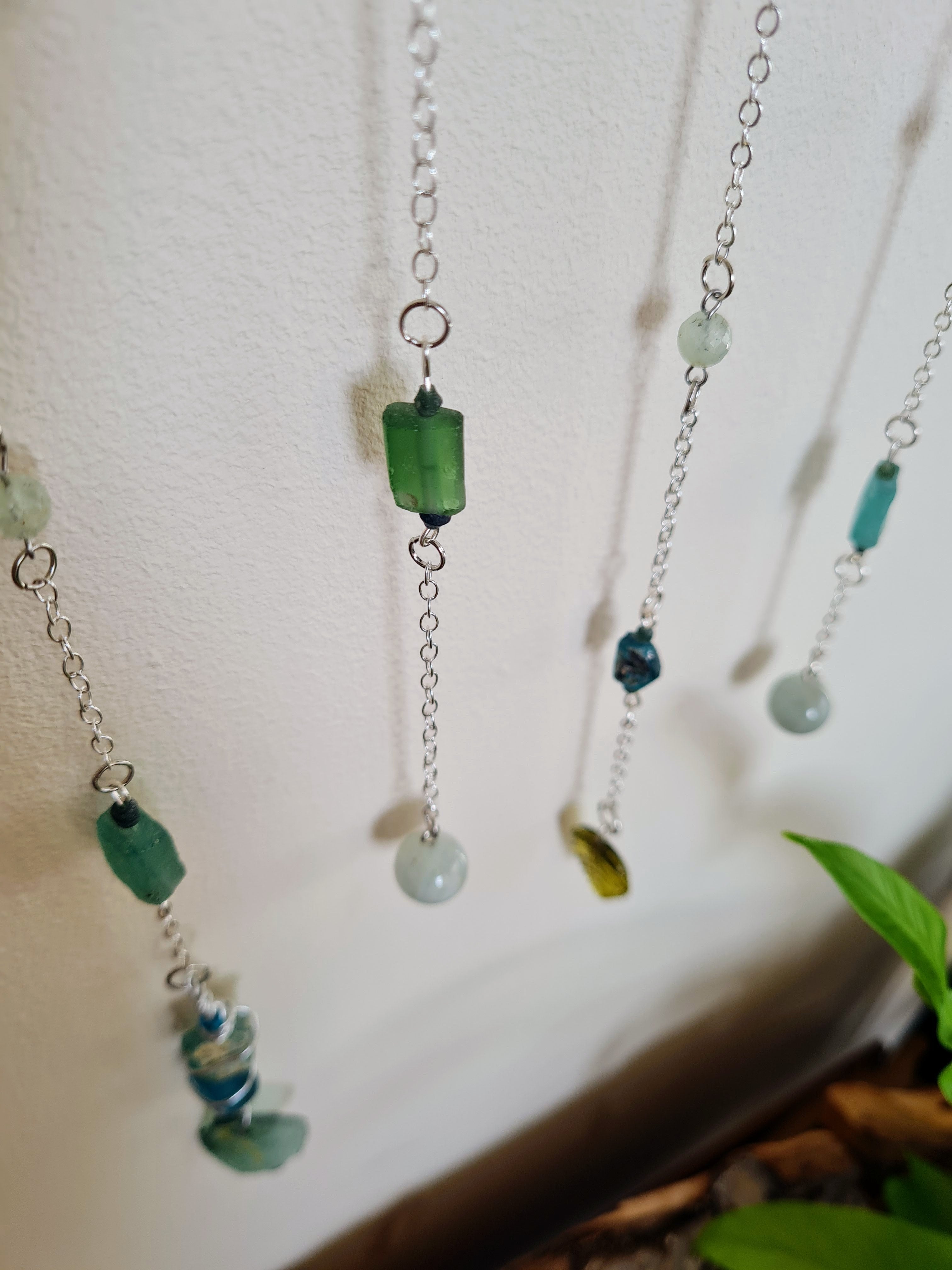 Roman glass and Aquamarine beads hanging on chains