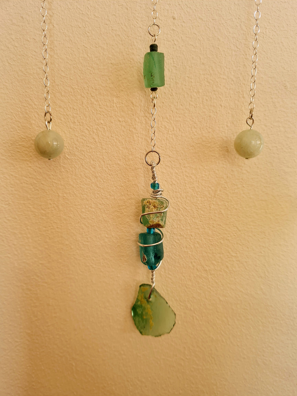 Roman glass decoration  in green