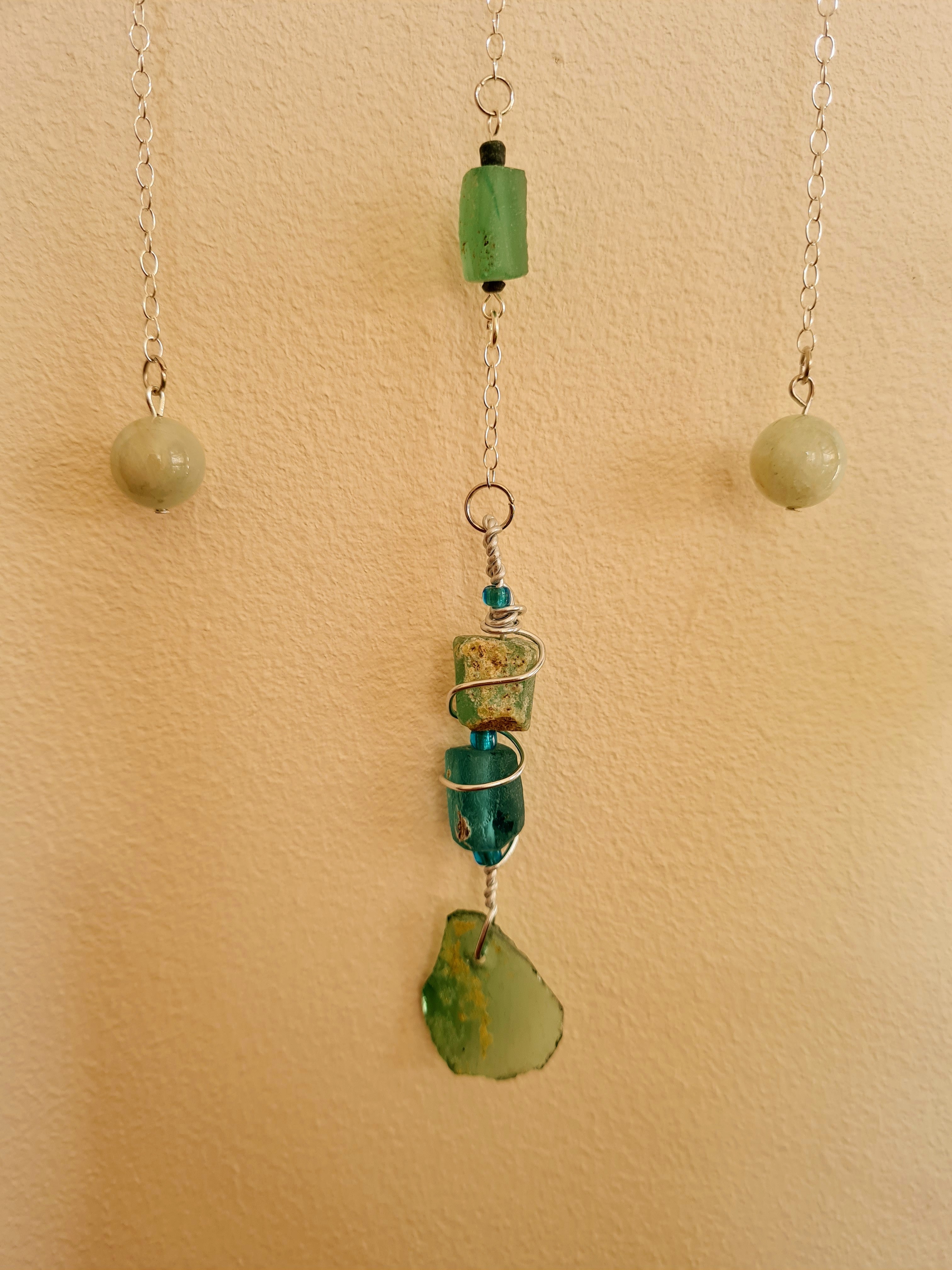 Roman glass decoration  in green