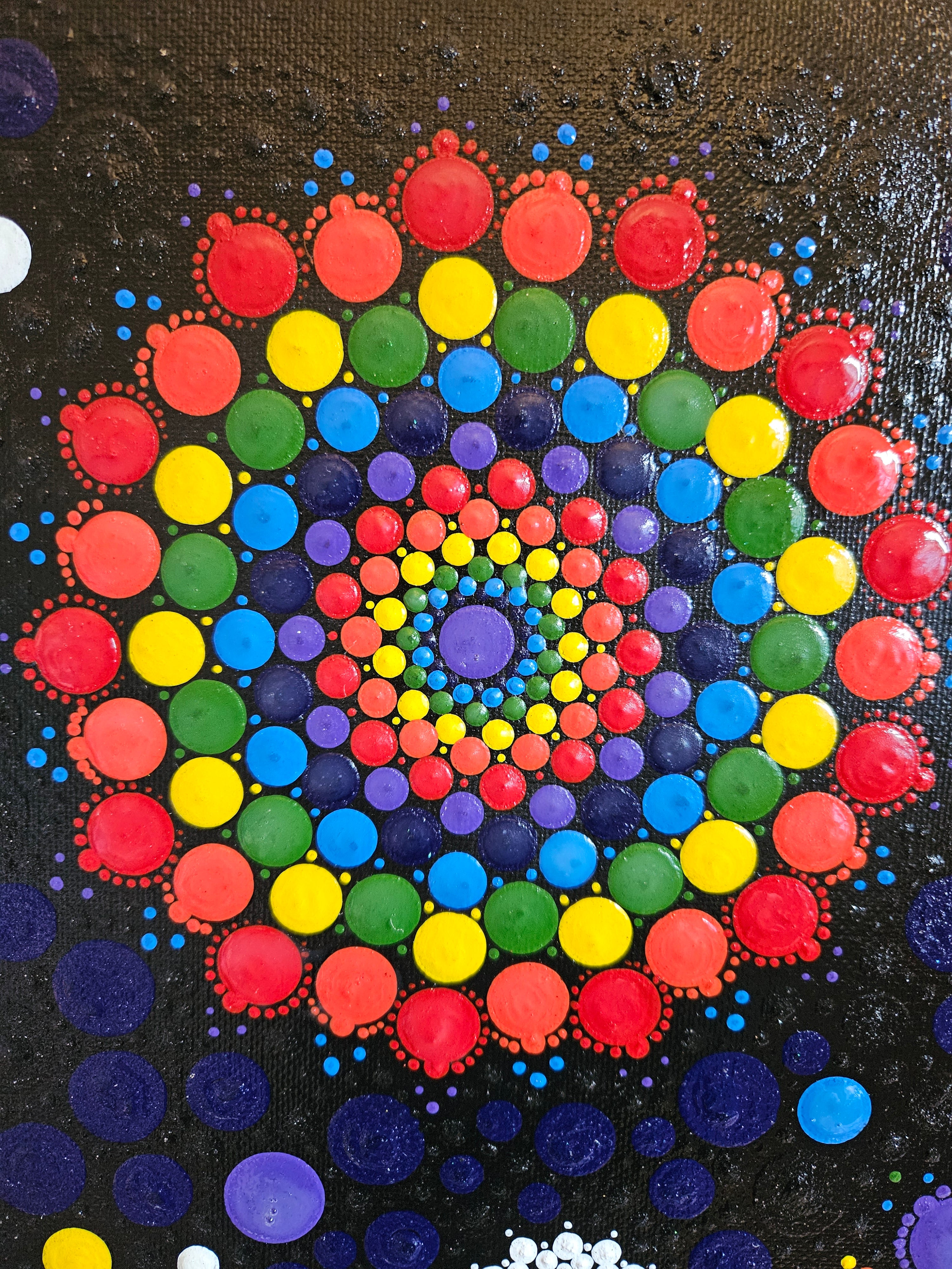 Colorful dot pattern on a black background