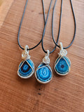 Three Blue Quartz pendants in silver wire