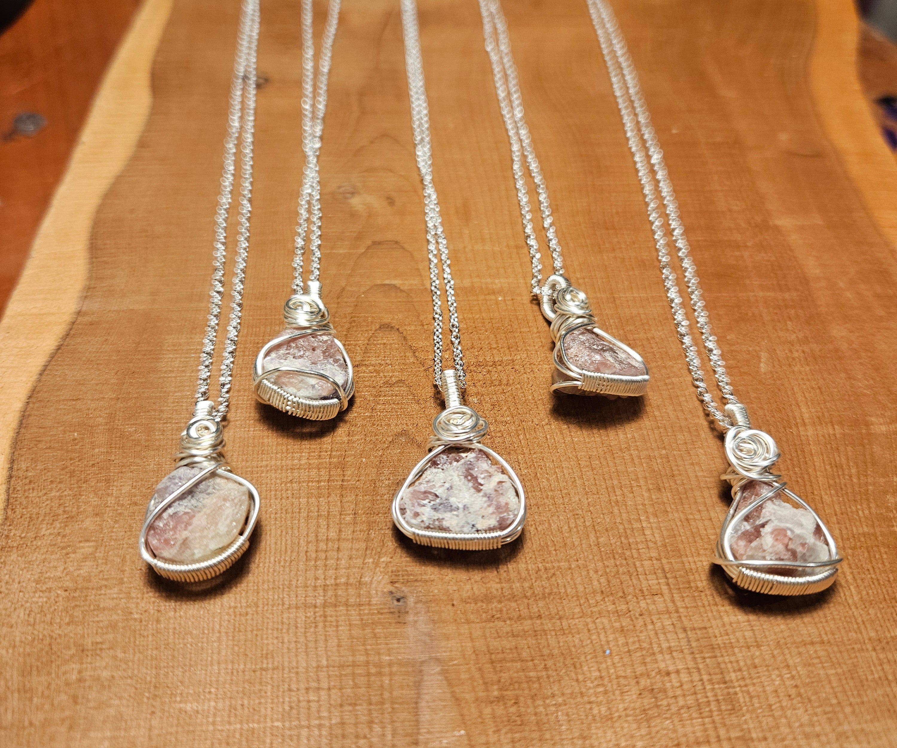 Five pink Rhodonite and silver necklaces