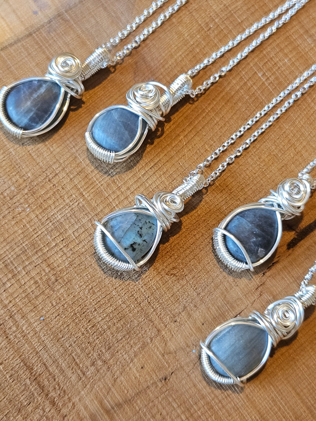 Five blue flashy Labradorite and silver necklaces