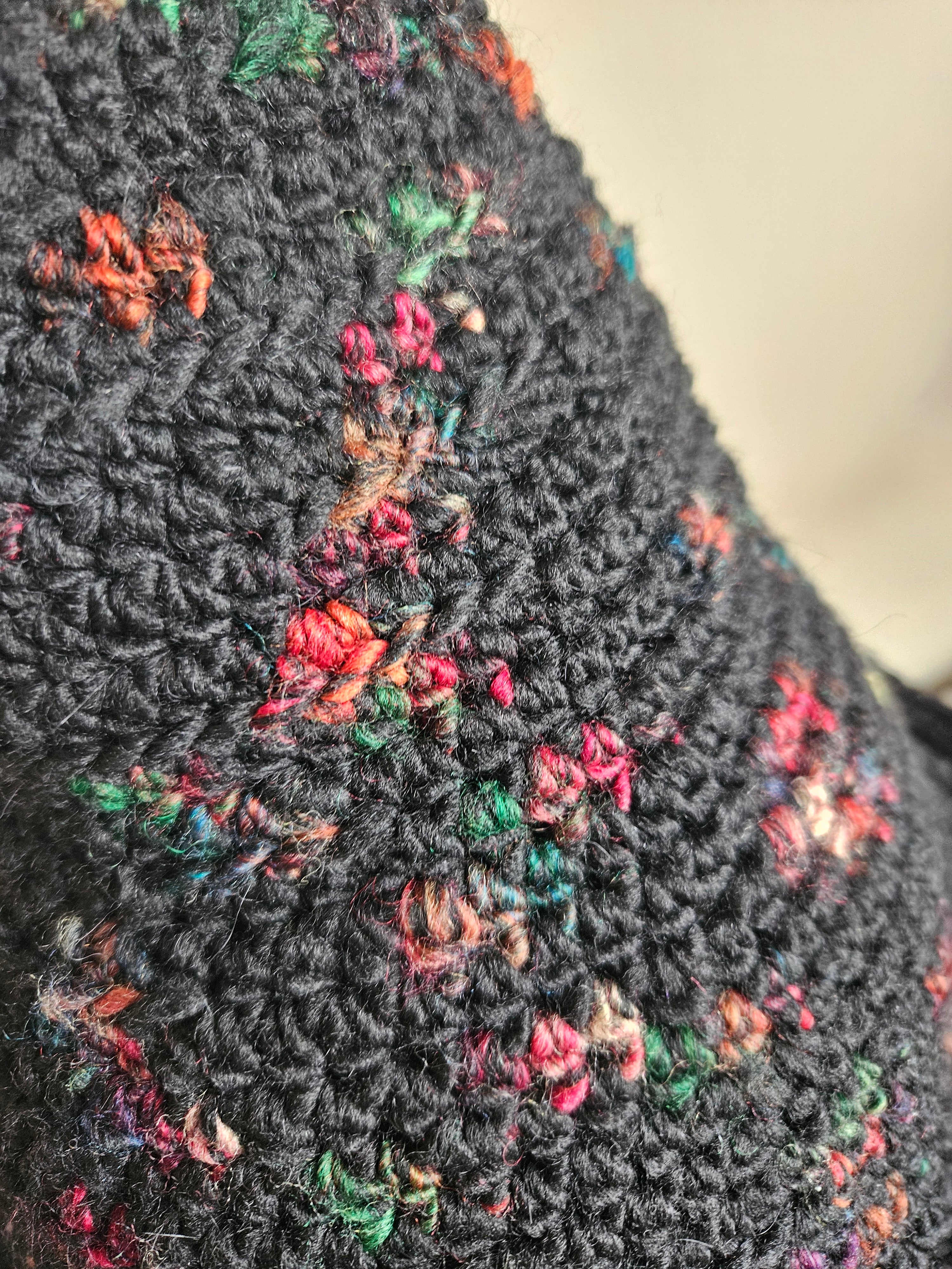Close up of crochet witch hat flower pattern 