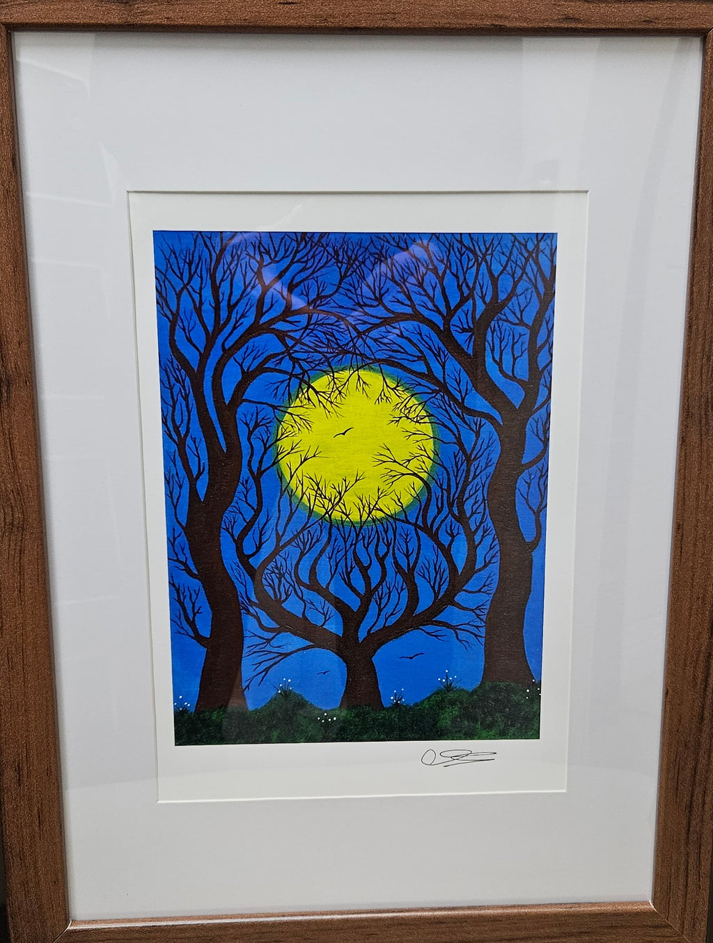 Ostara Rising in walnut frame