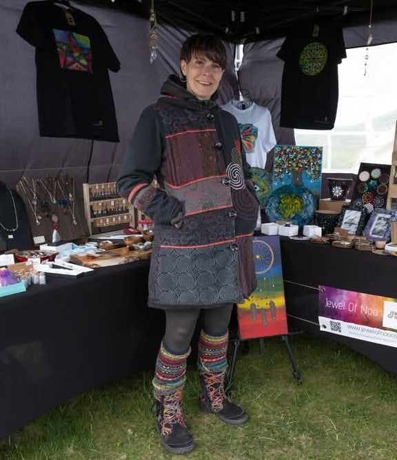 Owner of Jewel Of Noo in front of her stall