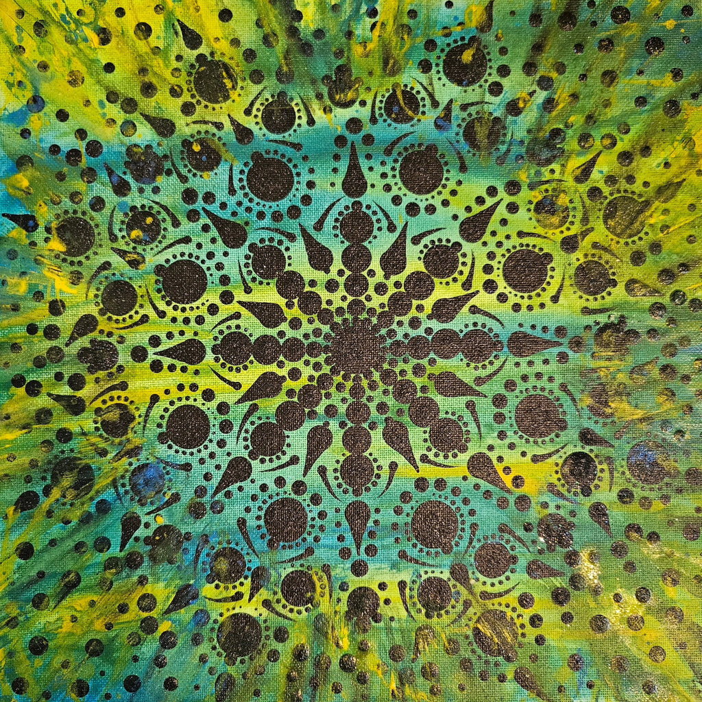 Black mandala pattern on a green background