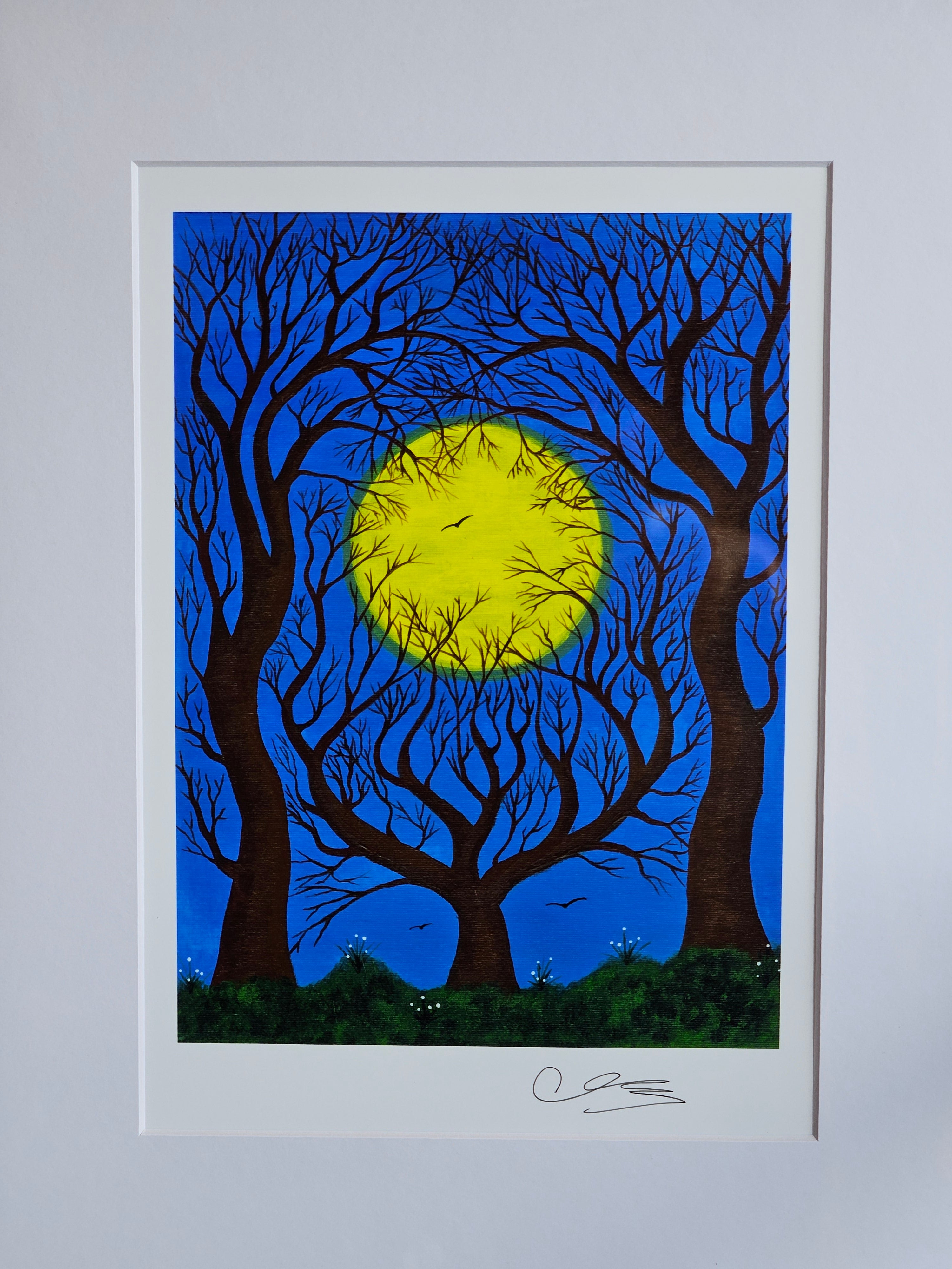 Mounted artwork of a yellow circle sun with brown tree branches against a blue background
