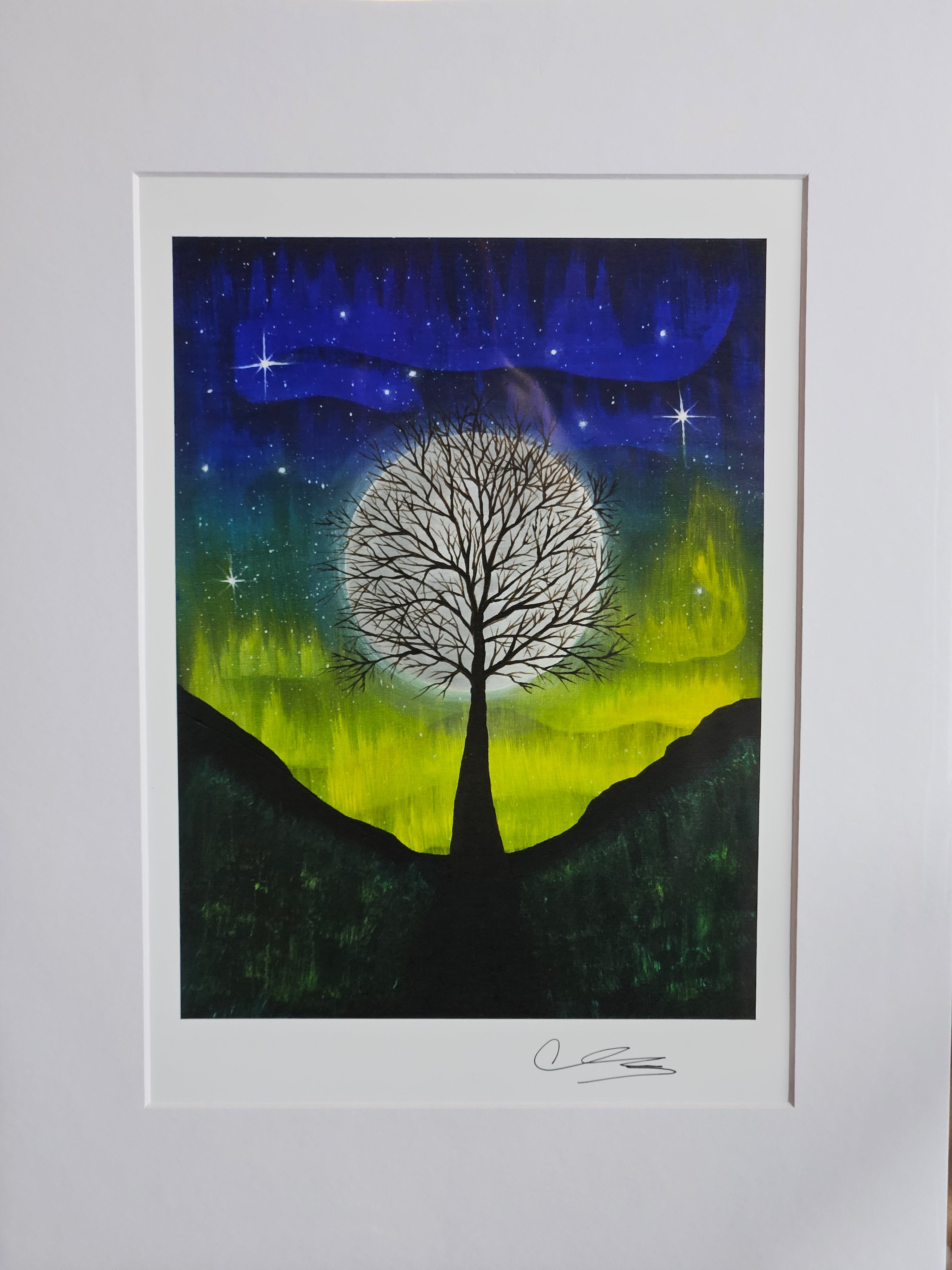 Sycamore gap in front of a full moon with a northern lights sky