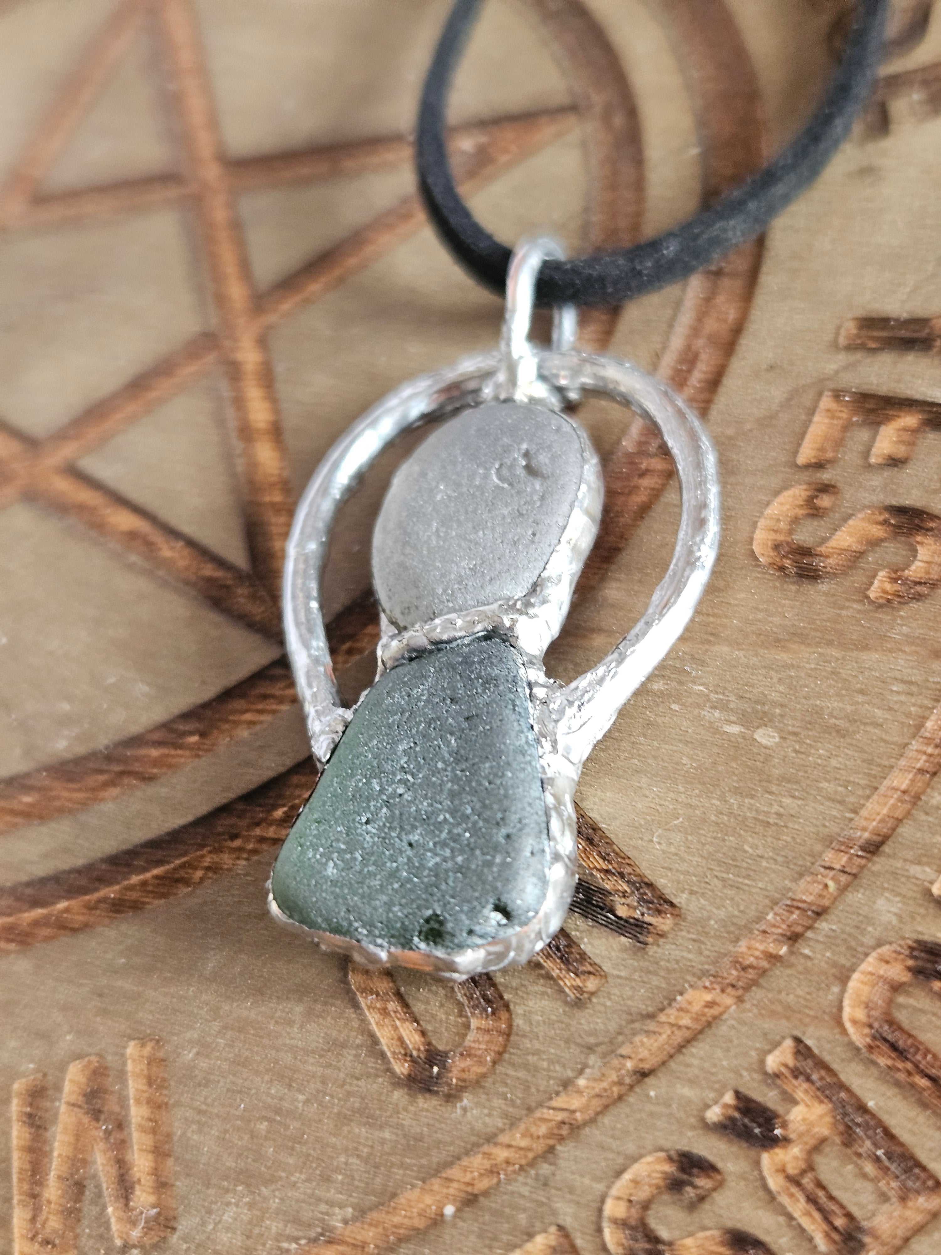Close up of seaglass goddess pendant