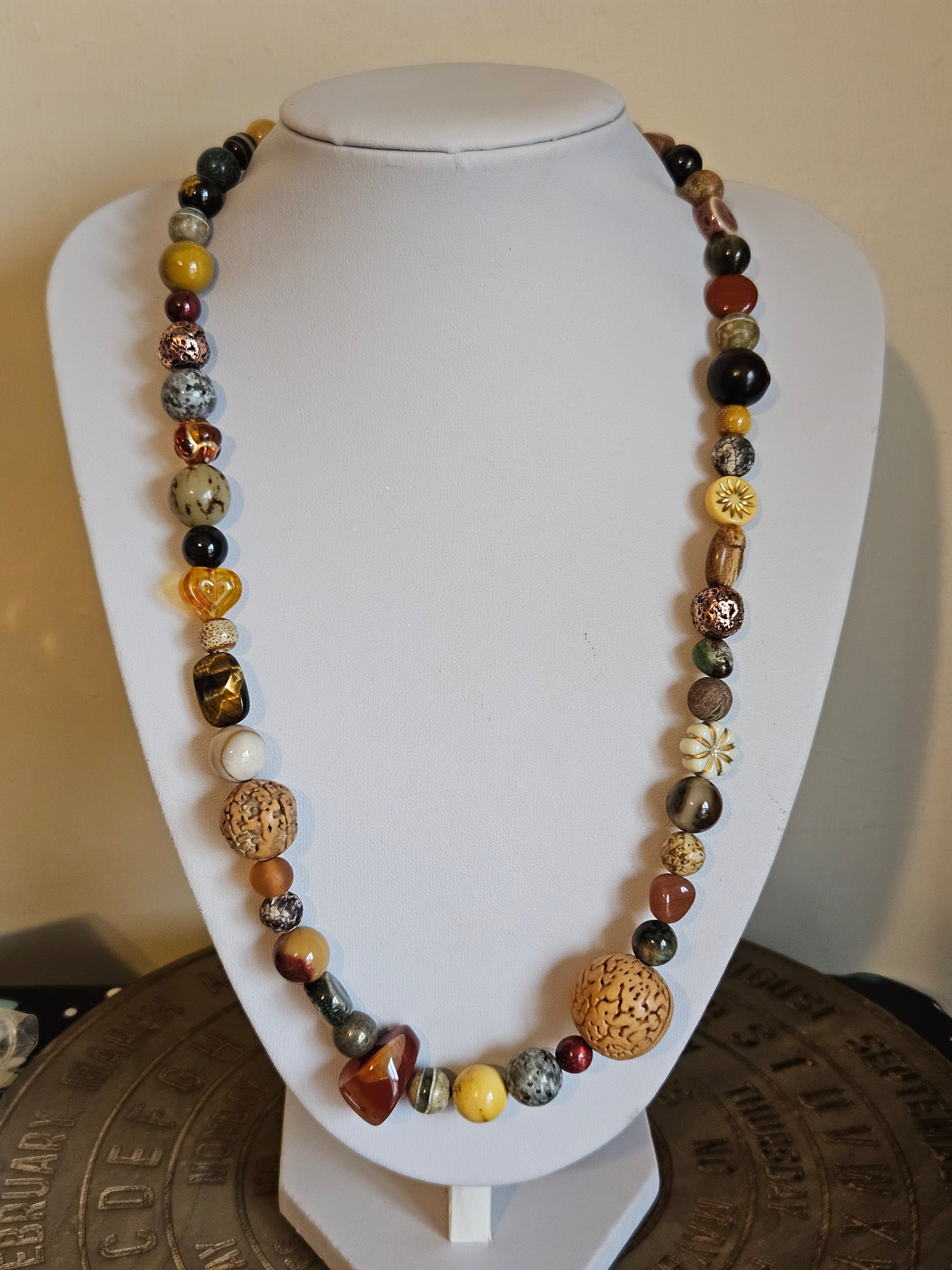 Necklace with multicolored beads on a mannequin bust