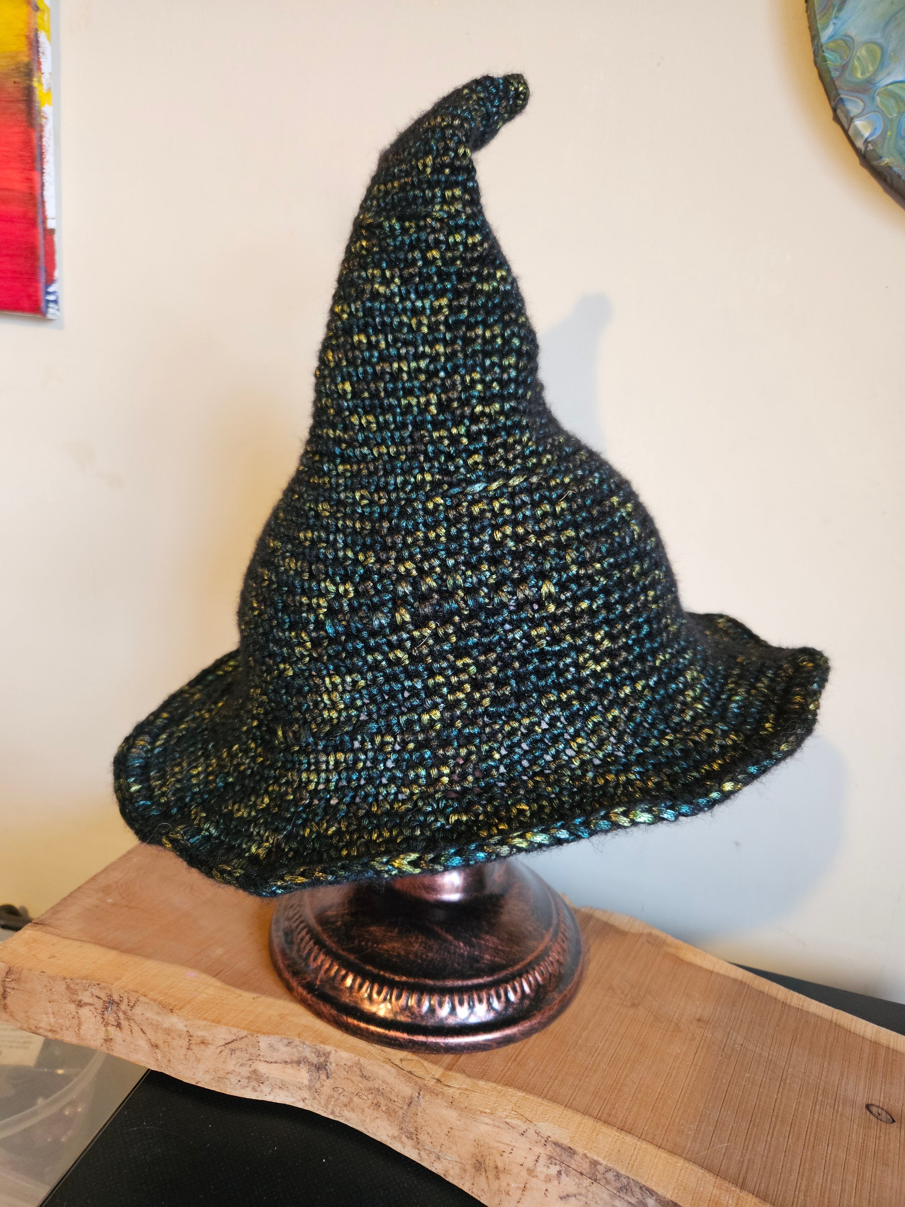 Crochet witches hat in green and gold