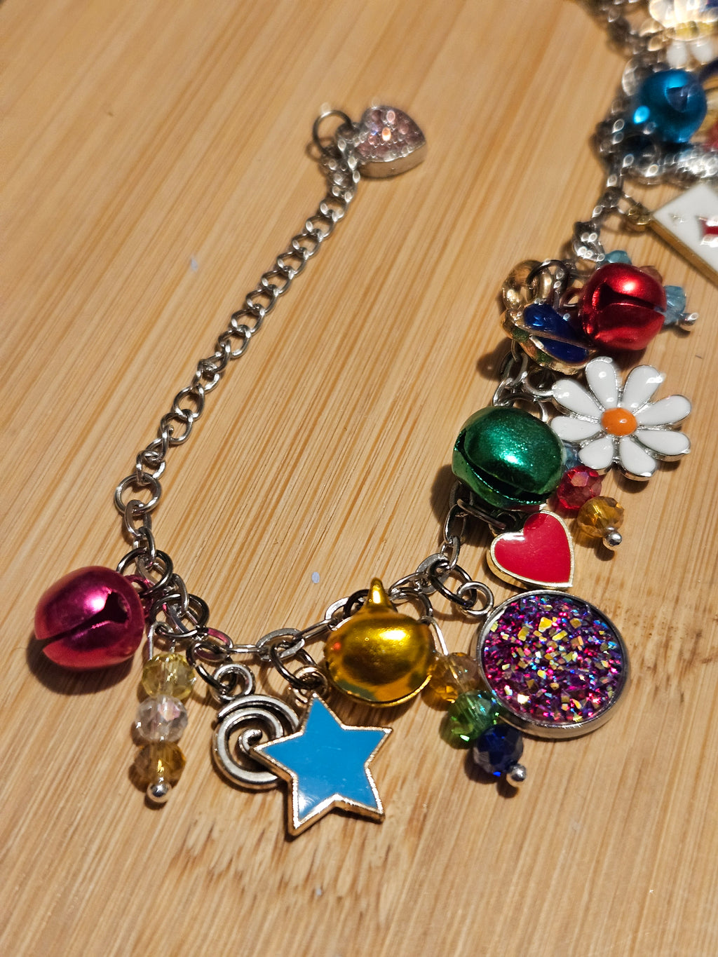 Charm Bracelet With Cubic Zerconia And Colourful Bells