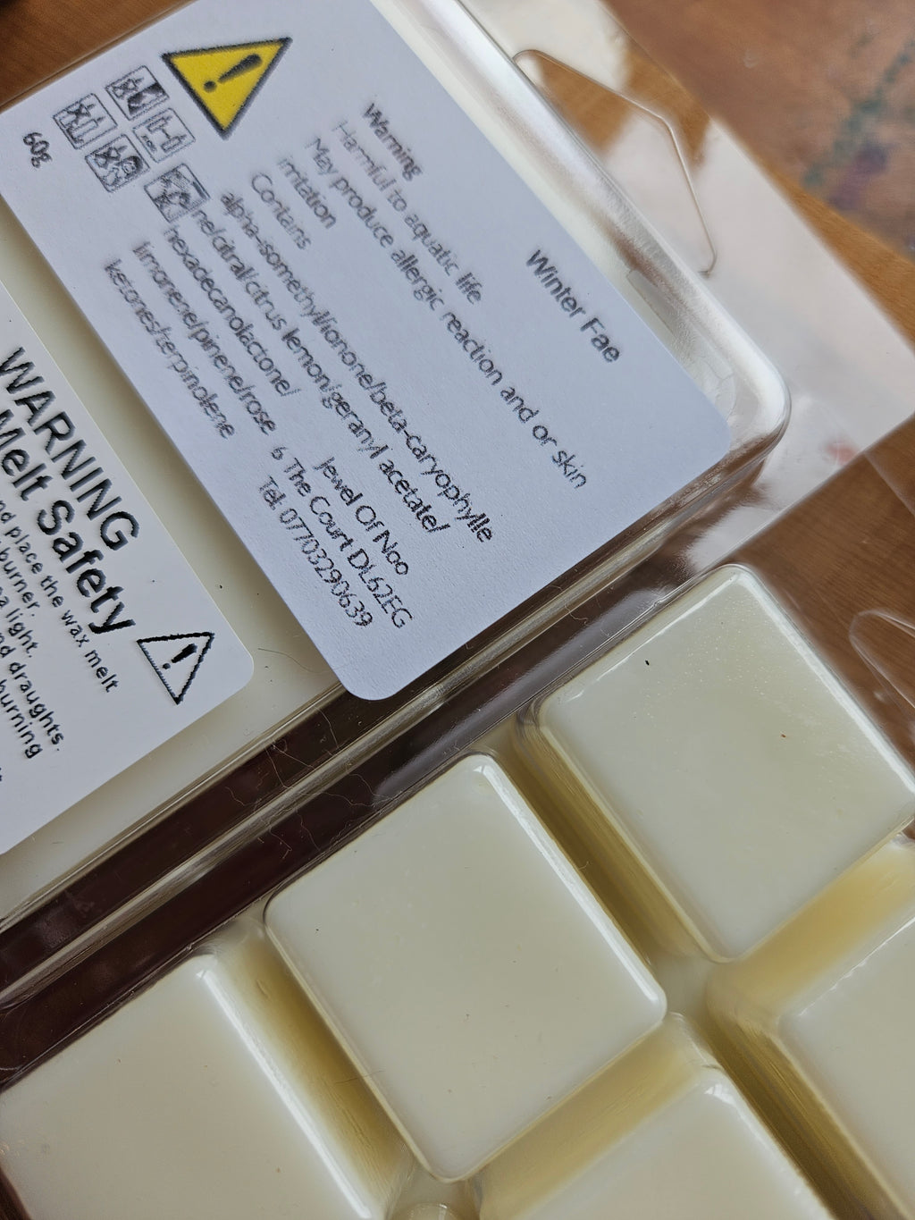 Winter Fae wax melts in a plastic container