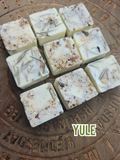 9 handmade Yule artisan wax melts with dried pine needles and botanical incense