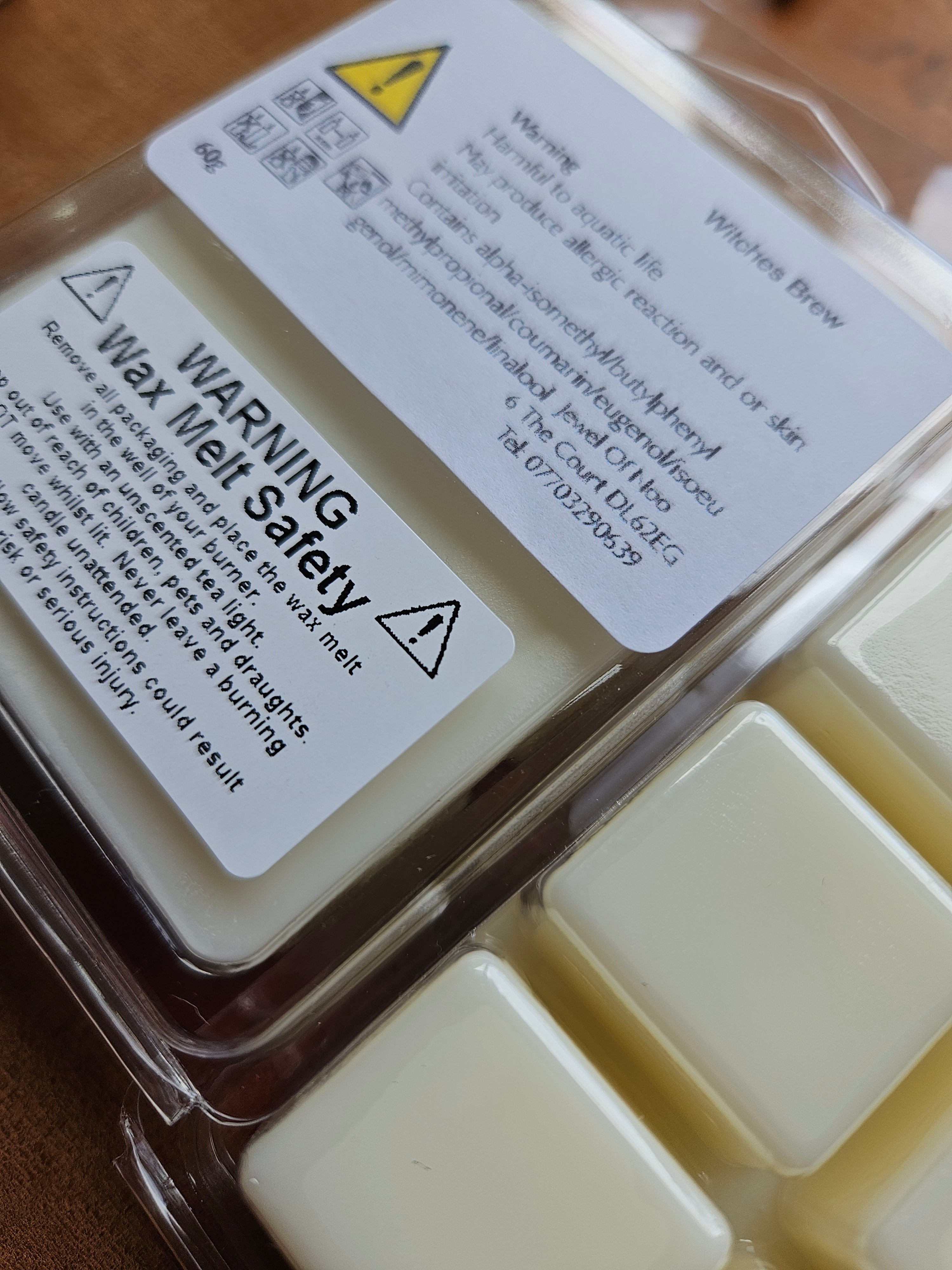 Witches Brew wax melt in plastic container