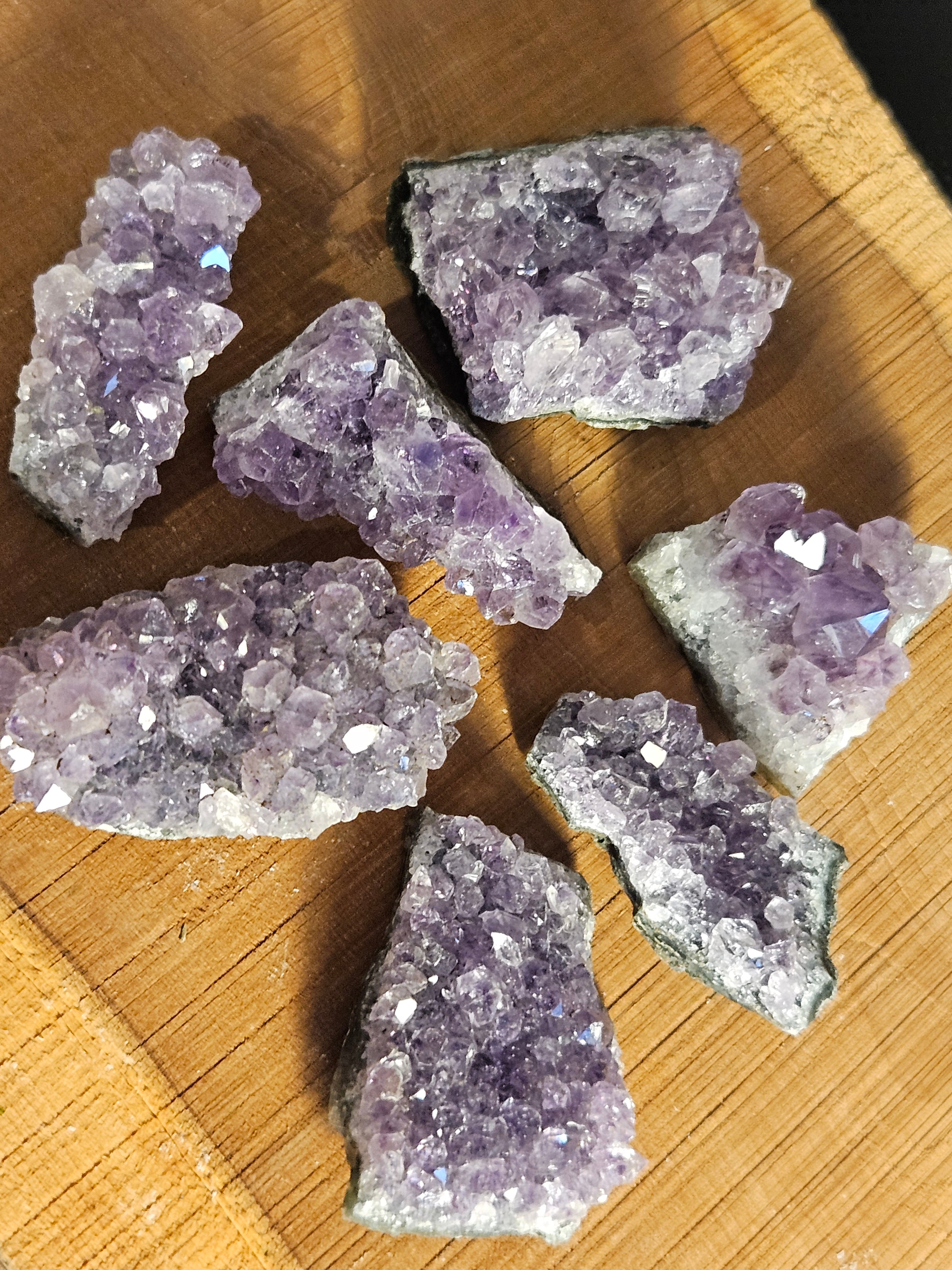 Amethyst Druzy mini clusters on a wooden board