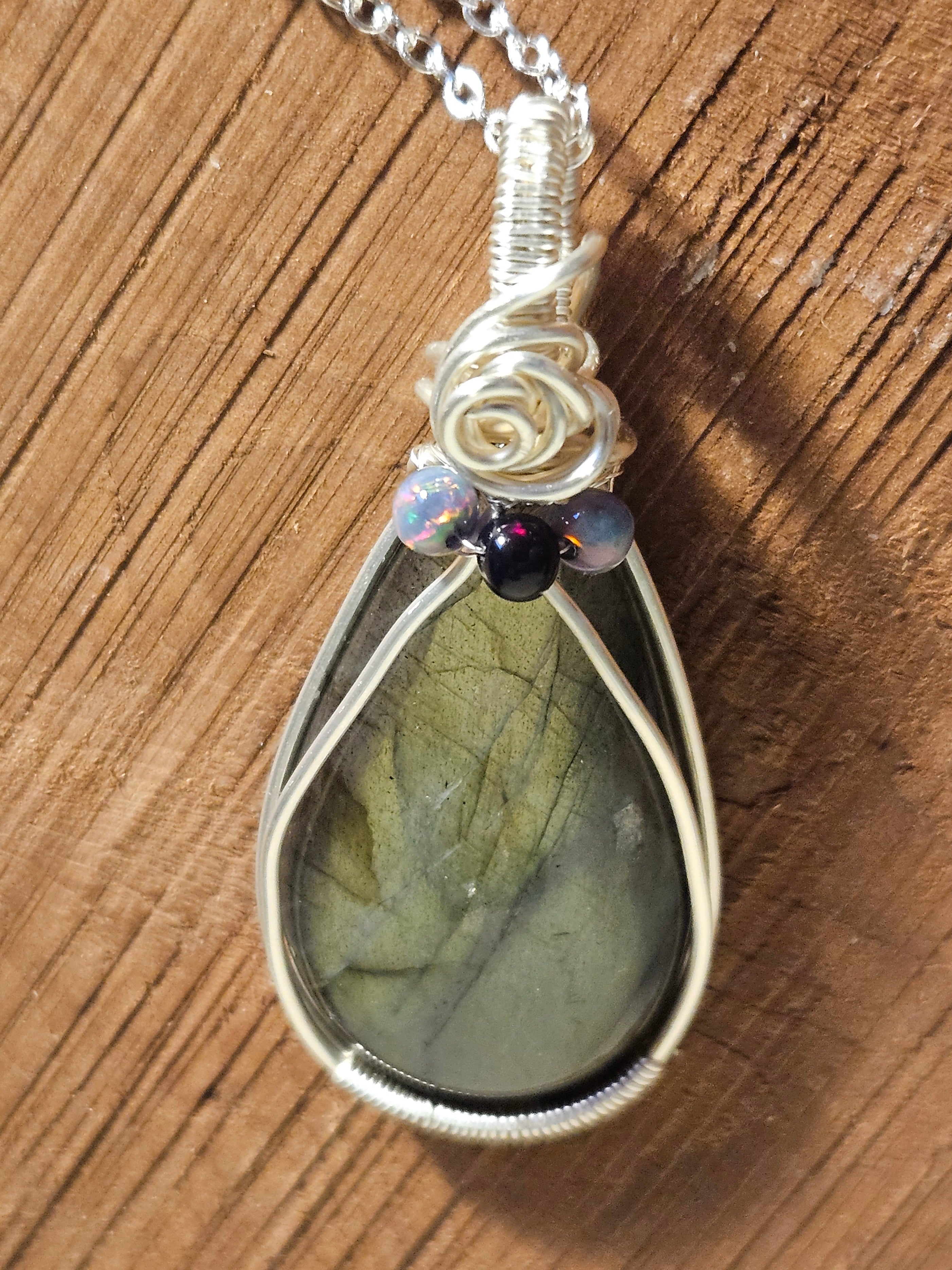 Silver wire wrapped pendant with Labradorite and Opals