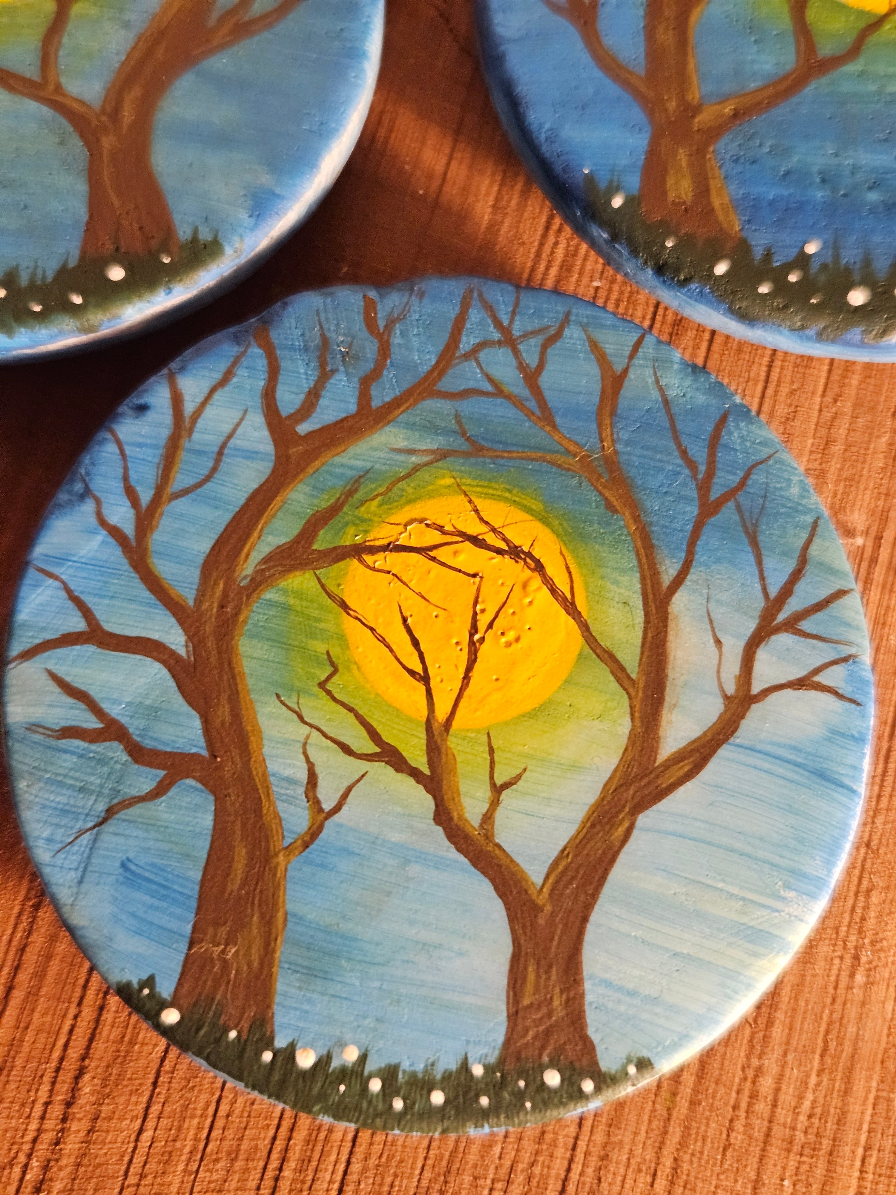Miniature tree painting on round ceramic magnet