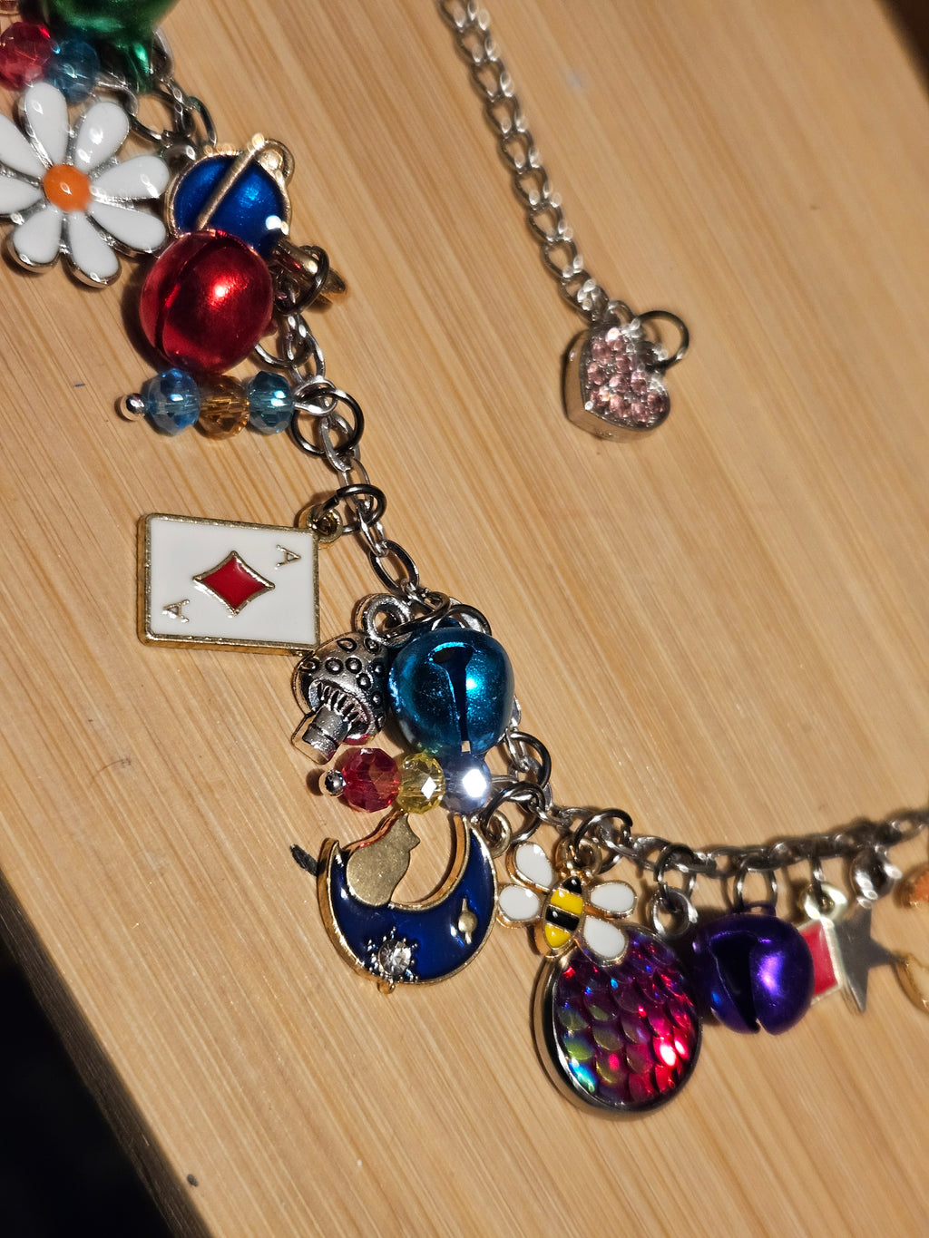 Charm Bracelet With Cubic Zerconia And Colourful Bells